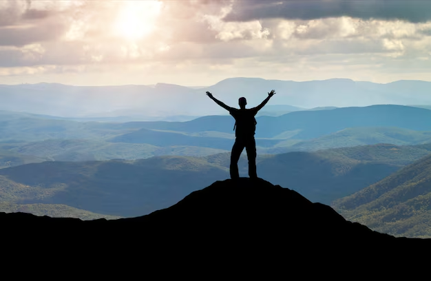 Silhouette on mountain top
